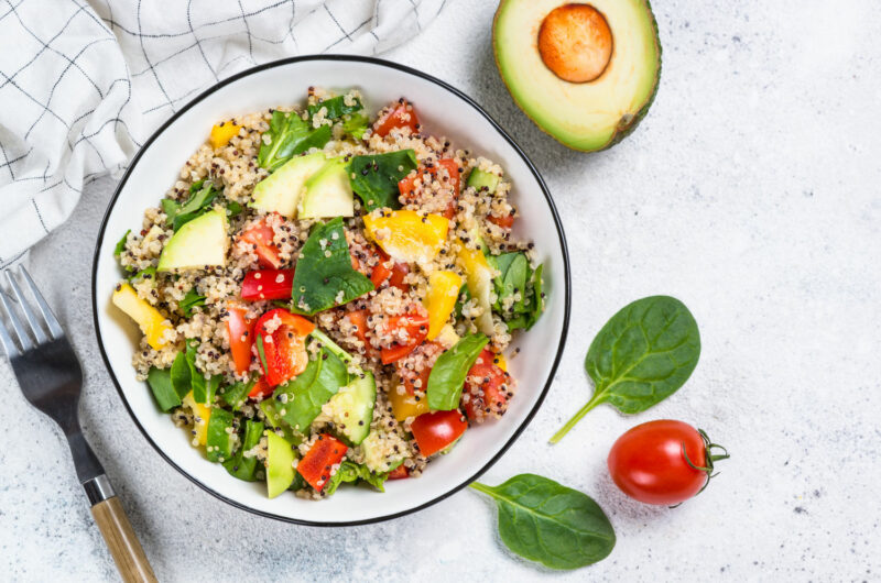 Quinoa Salad with Spinach, Pumpkin Seeds, and Fermented Carrots or Kimchi